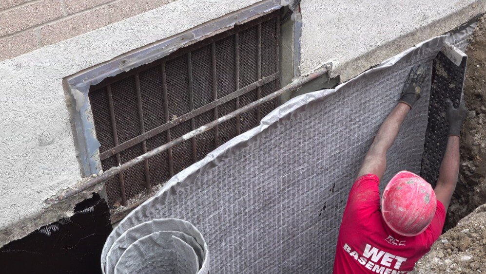 safe seal team performing exterior waterproofing